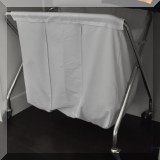 Z03. Rolling laundry sorter. 